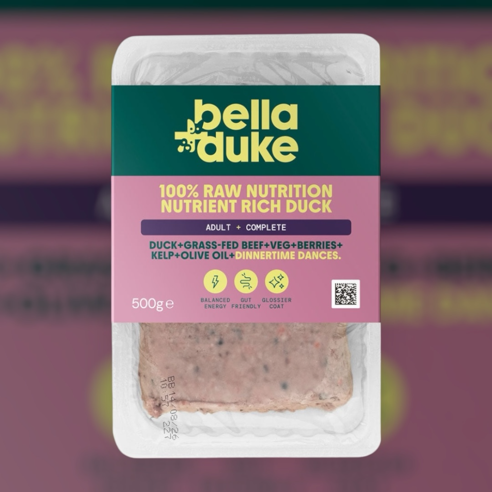 A 500g pack of Hilltop Pet Food Bella and Duke Raw Duck with badges and a pickup-only banner on the nutrition label.