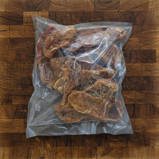 clear bag containing 1kg of dried chicken breast fillet for dogs