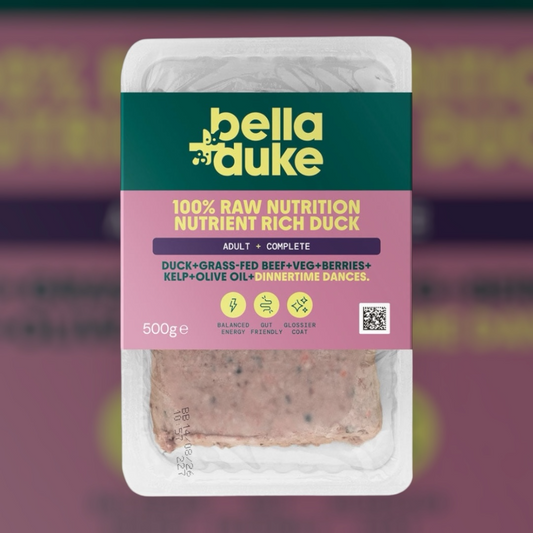 A 500g pack of Hilltop Pet Food Bella and Duke Raw Duck with badges and a pickup-only banner on the nutrition label.