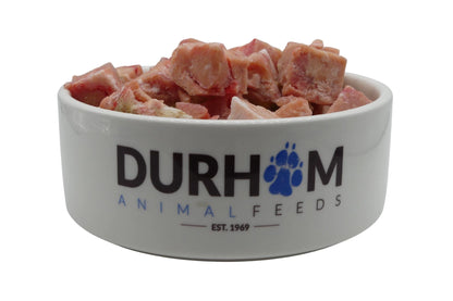 Raw pig pancreas chunks for dogs on a tray – enzyme-rich organ meat for healthy digestion
