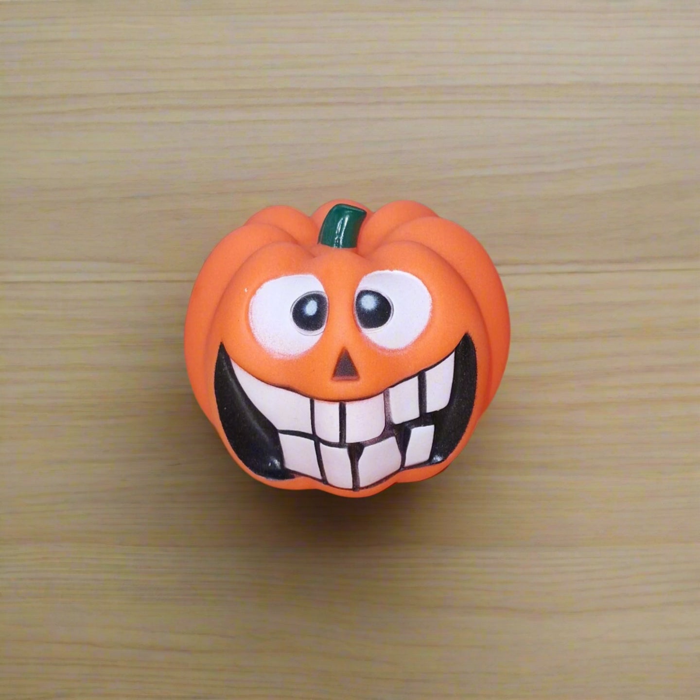 orange pumpkin squeaky dog toy