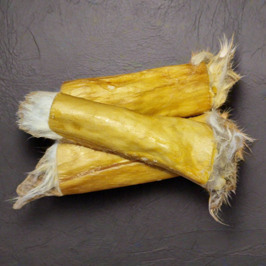 photo of 3 rabbit pelt mini rolls on a slate worktop