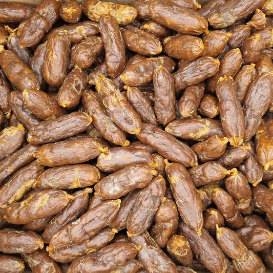 Brown beef meat sausages in closeup