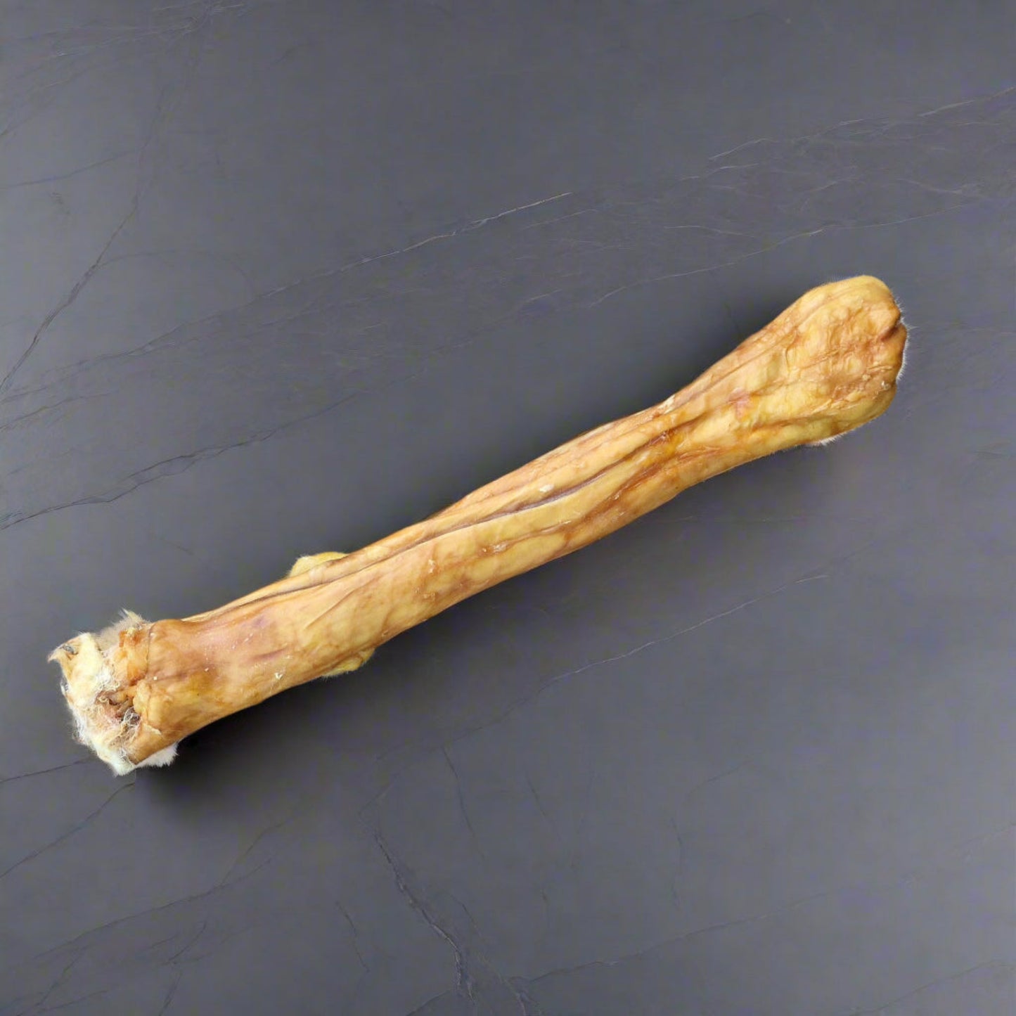 single rabbit pelt on a slate worktop